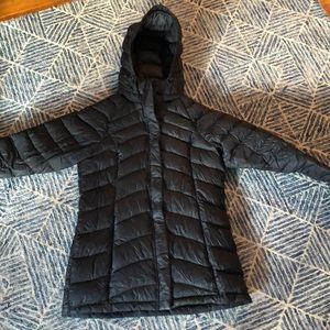Women’s medium black North face jacket.